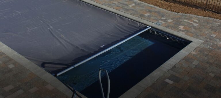 JC Pool Distributing LLC Automatic Pool Cover Example on WoodWall Pool Kit
